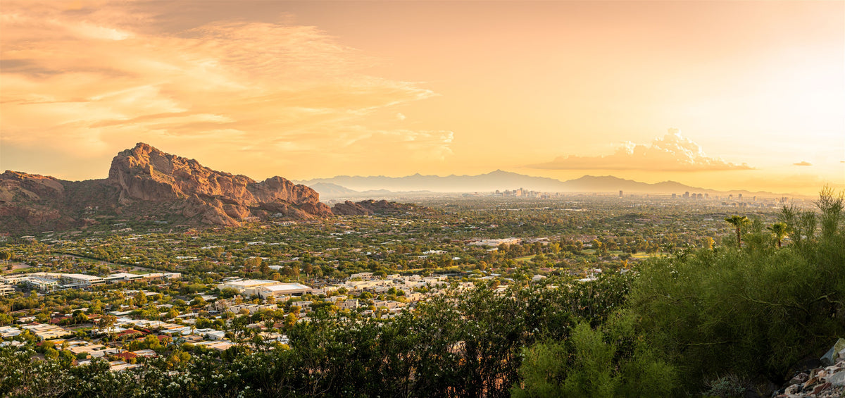 Camelback Mountain and the Phoenix skyline glowing at sunset
