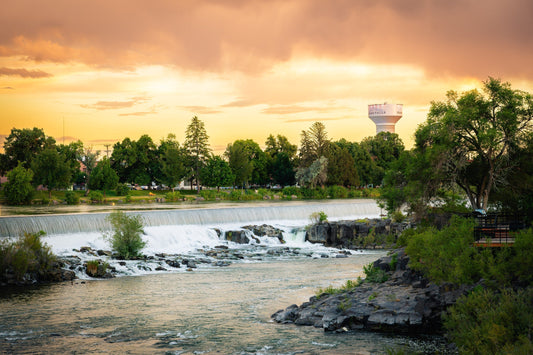 Idaho Falls River Walk and waterfalls along the Snake River at sunset